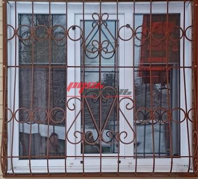 сварная дутая решетка для дачного дома